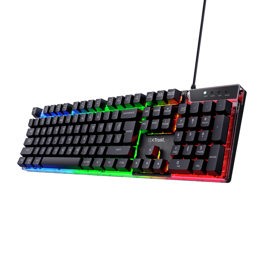 Teclado gaming Trust GXT 835 en setup gamer con iluminación LED activada