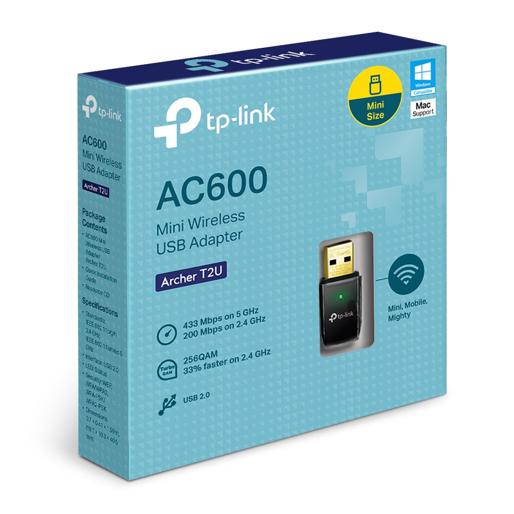 TP-Link Archer T2U AC600 sobre escritorio junto a router inalámbrico