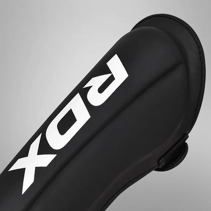 RDX Espinilleras con Empeine Negro/Blanco, T1