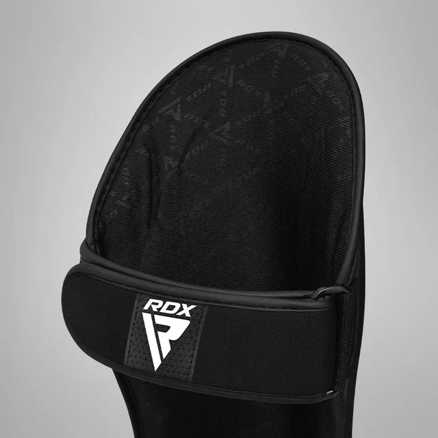 RDX Espinilleras con Empeine Negro/Blanco, T1