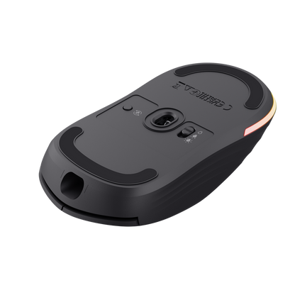 Mouse Trust GXT 927 Redex+ junto a receptor inalámbrico USB y accesorios