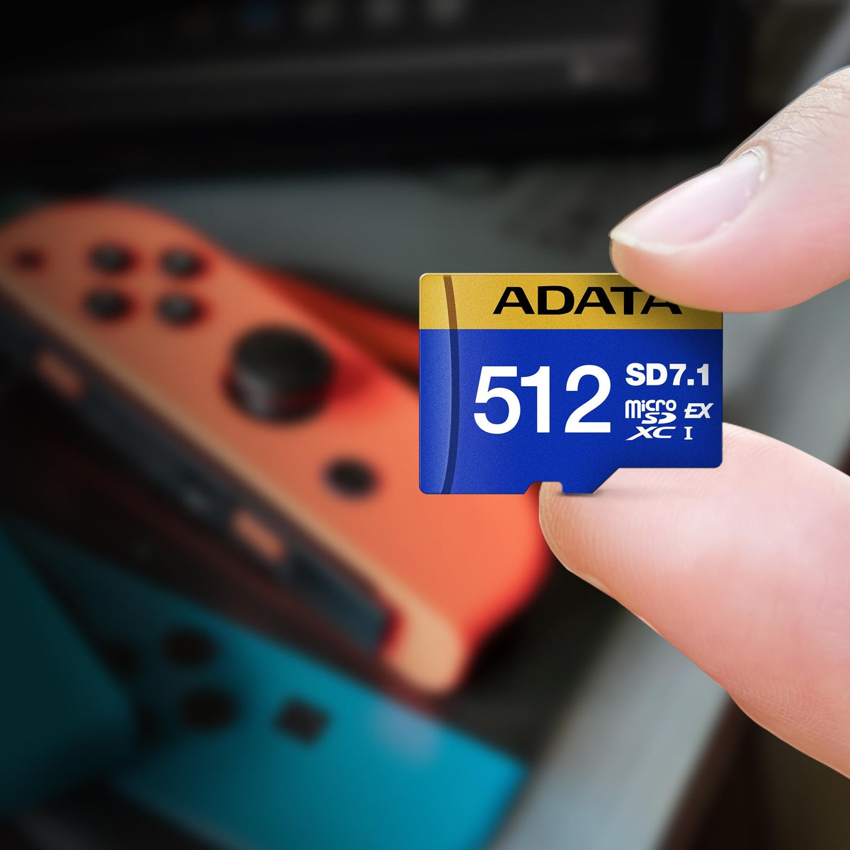 MicroSD ADATA 512GB UHS-II comparación de tamaño con moneda