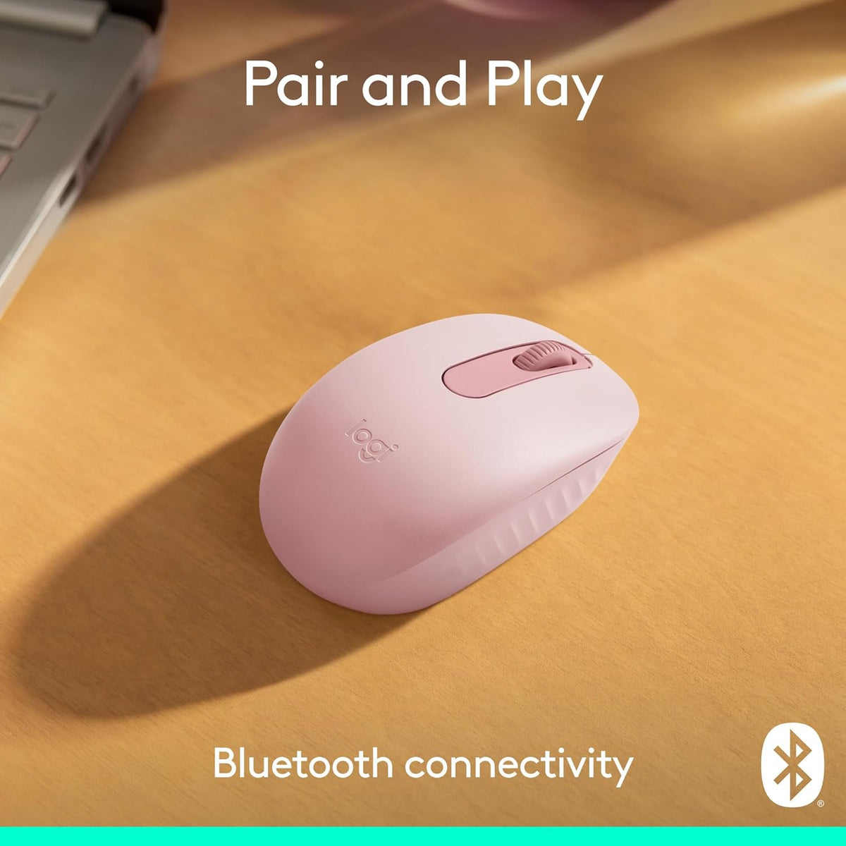 Vista lateral izquierda mouse inalámbrico Logitech M196 rosa