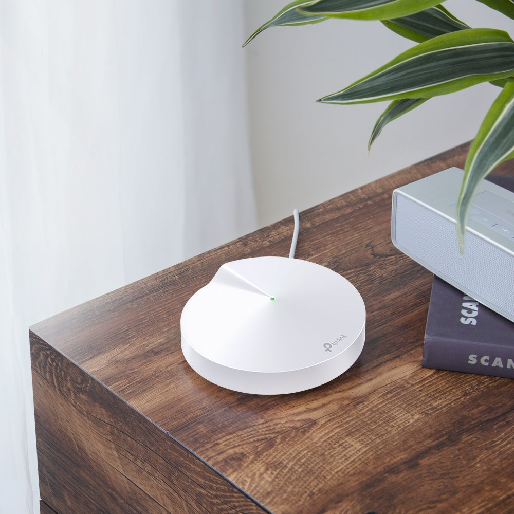 TP-Link Deco M5 vista lateral mostrando ventilación y acabado mate